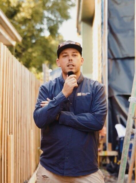 High Level Homes — builder to camera on site